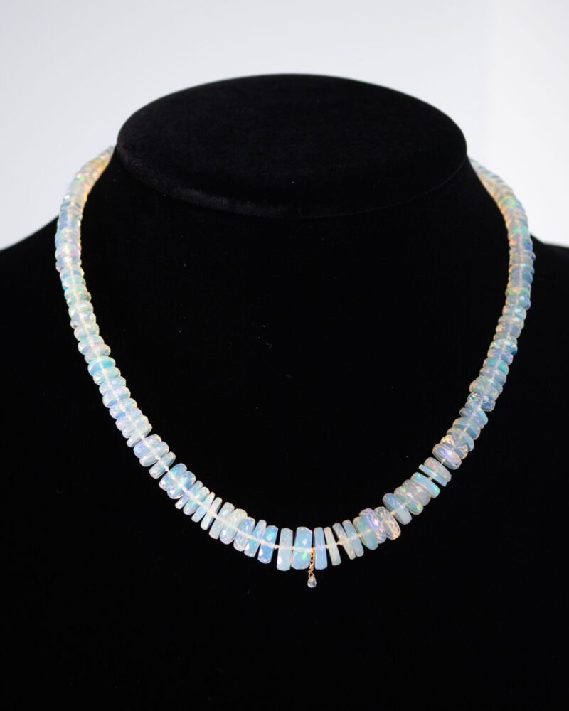ethiopian opal disk strand with diamond drop