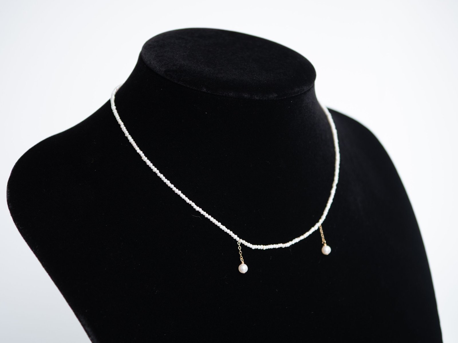 seed pearl necklace with gold and pearl drops